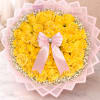 Bouquet of yellow roses with a pink ribbon and baby’s breath