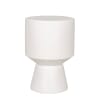 White ceramic pedestal vase on a plain background