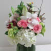 A simple yet elegant arrangement to celebrate a special day. This arrangement