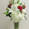 A Valentine's mix of red white and red roses, perfectly accented with