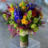 A tall abundance of colorful seasonal blooms!
PLEASE NOTE, YOUR ARRANGEMENT MAY NOT