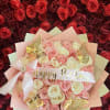 Pink and cream rose bouquet with a Happy Birthday ribbon