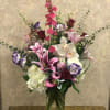 Type of Flowers: Purple Lisianthus, Stargazers, Cymbidium Orchids, White Hydrangeas, Pink Larkspur