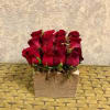 Type of Flowers: Red Roses and moss in a handmade, reusable, wooden
