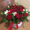 A lush dome of roses and freesia that reads as effortlessly romantic-Punta