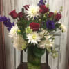 Type of Flowers: Red Roses, White Hydrangeas, Purple Delphinium, Pink Lisianthus, White