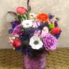 Bright and Cheerful with roses, anemone, ranunculus, tulips, stock all in a