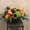 Fall centerpiece, great for a dinner party.
Type of Flowers: Yellow Sunflowers, Orange