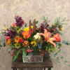 Type of Flowers: Purple Orchids, Orange Roses, Asiatic Orange Lilies, Fall-colored Daisies
