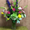 Type of Flowers: Pink Snapdragon, Purple Larkspur, Pink Peonies (seasonal), Pink Stargazers