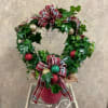 Live ivy Wreath in a planter decorating ornaments and ribbon.
Deluxe and premium