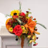 This cascading natural pumpkin is a perfect centerpiece this holiday season. Fall