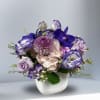 If her favorite color is purple, she'd love this arrangement including purple