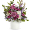 Lavender roses and white daisies in a white vase