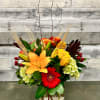 This lovely mix of fall colors is sure to brighten any area!