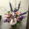 Type of Flowers: Calla Lilies, Roses, Larkspur, Hydrangea, Stock, Branches and more