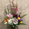 Type of Flowers: Purple Stock, Blue Iris, Cymbidium Orange Orchid, Orange Roses