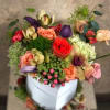 Spring color florals in a heart-shaped box. Perfect for Moms.
Type of flowers: