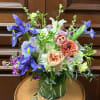 This Spring Garden has soft color garden roses (depending on availability), Kale