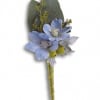Light blue floral boutonniere with small yellow berries and a wrapped green stem.