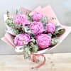 The standard size holds 6 peonies with seasonal greenery. 