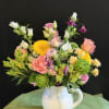 A cheerful mix of soft pinks, sunny yellows, fresh greens, and delicate