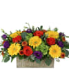 Colorful flower arrangement in a rustic wooden box