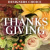 Designers choice of mixed fall flowers arranged in vase