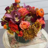 Fall flowers with a compact design in a 5x5 cylinder wrapped with