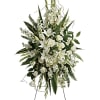 White floral standing spray on an easel