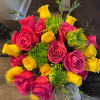 Bouquet of pink and yellow roses with green chrysanthemum blooms