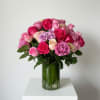 A lush dome of roses in hot pink, blush, lavender and pale