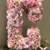 Pink floral letter arrangement with roses and hydrangeas