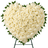 Heart-shaped arrangement of white roses on a stand