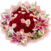 A luxurious bouquet featuring Rich, red and soft blush roses paired with