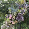 Succulent bouquet with pastel flowers and berries