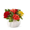 Mixed roses in a white pumpkin-shaped vase