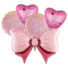 Pink baby shower balloons shaped like hearts and bows