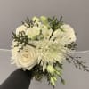 White bouquet with roses, chrysanthemums, and green buds