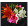 Bright bouquet with orange lilies, pink roses, and white orchids