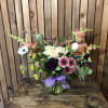 A carefully curated floral design created by our expert florists using premium