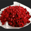 A lush dome of velvety red roses makes an immediate romantic statement