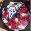 Unleash spooky elegance with Screaming Roses. This hauntingly beautiful bouquet features deep