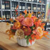 Thanksgiving Day is complete with this bountiful centerpiece.  Includes garden roses