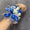 White spray roses with royal blue baby breath , white &amp; royal