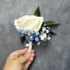 White rose with Royal blue baby breath wrapped with white ribbon 
