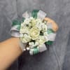 White spray roses with emerald green &amp; silver ribbon with diamond accents