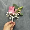 Dusty pink rose Boutonniere with snapdragon beautifully wrapped 