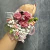 Dusty rose wrist corsage with pearl bracelet 