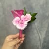 Bright hot-pink rose paired with  pink carnation, green accents beautifully wrapped